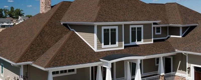 Architectural asphalt shingle roof in a warm brown blend on a craftsman style home — John Beal Roofing