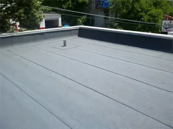 Flat commercial roofing membrane installation with gravel edges — John Beal Roofing commercial roofing in Maryland Heights, MO
