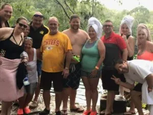 Roofing team and families gathered outdoors for a company event — John Beal Roofing storm damage restoration in Fulton, MO