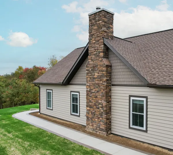 CedarMAX and Harbor Mill siding in Pueblo and Clay — home exterior, John Beal Roofing siding colors