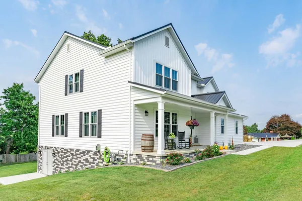 CedarMAX siding in White — home exterior, John Beal Roofing siding colors