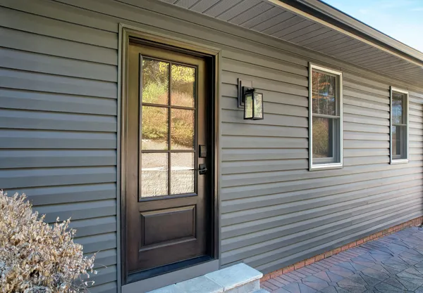 CedarMAX and HeartTech siding in Nightfall — home exterior, John Beal Roofing siding colors