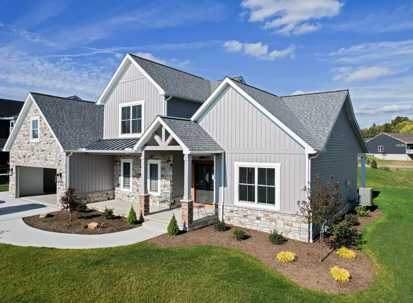 Cedar Peaks and HeartTech siding in Pewter — home exterior