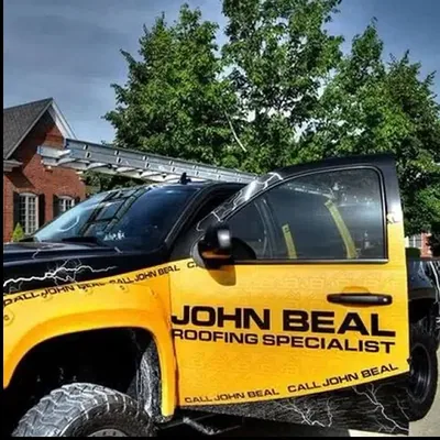 John Beal Roofing work truck parked outside a job — John Beal Roofing roofing in Lebanon, MO