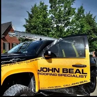 John Beal Roofing service truck parked on a residential street — John Beal Roofing residential roofing in Marshfield, MO