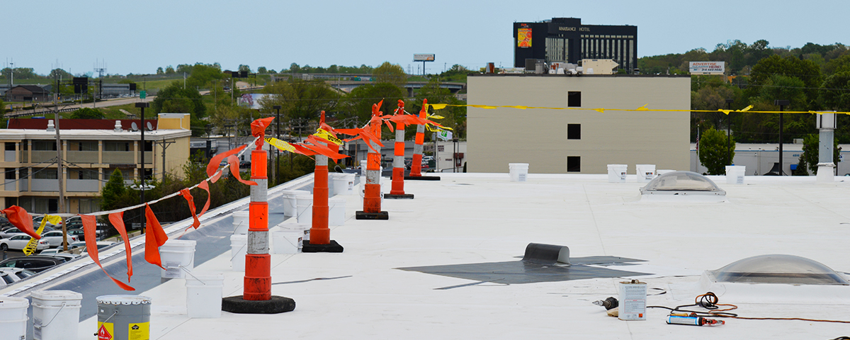 A commercial flat roof that is currently in progress of being installed.